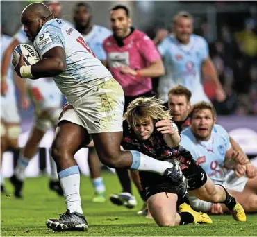  ?? Picture: Dan Mullan/Getty Images ?? Khutha Mchunu of the Bulls breaks past Dan Thomas of Bristol Bears to score his side’s second try during the Champions Cup match at Ashton Gate in Bristol, England.