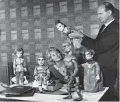  ?? CHRIS WARE/GETTY ?? Gerry and Sylvia Anderson are seen with some of the “Stingray”puppets in the mid-1960s.