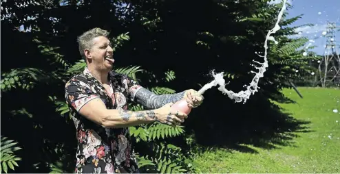  ?? Picture: Alon Skuy ?? Grant Renecle, aka Clean Cut Skolly, takes a break from his hectic double life as copywriter and TikTok star to pull a typical ‘boet’ stunt at home in his garden.