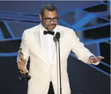  ?? CHIS PIZZELLO/THE ASSOCIATED PRESS ?? Jordan Peele is the first African-American to win for screenplay.