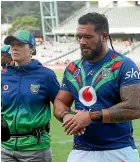  ??  ?? Ben Murdoch-Masila leaves the field with a head knock during the Warriors’ win over the Cowboys.