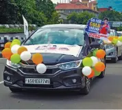  ??  ?? Supporters take out a car rally ‘Go for Gold Lovlina Borgohain’ in Guwahati on Tuesday to express solidarity and to pray for her ahead of the Tokyo Olympics women’s boxing semifinal on Wednesday.