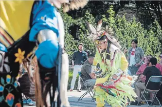  ?? MATTHEW SMITH THE CANADIAN PRESS FILE PHOTO ?? A dancer performs a ceremonial dance at a flag raising ceremony to honour residentia­l school and ’60s Scoop survivors in Saskatoon in May.