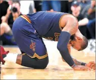  ?? DARREN ABATE / AP ?? Cleveland Cavaliers forward LeBron James falls during the second half of Monday’s 103-74 loss to the Spurs in San Antonio. The Cavaliers fell a half-game behind Boston for the top seed in the Eastern Conference playoffs.