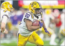  ?? [BRETT DAVIS/USA TODAY SPORTS] ?? Clyde Edwards-Helaire (22) leads the undefeated Tigers (13-0) with 1,290 yards rushing and 16 touchdowns. He was a first-team AllSouthea­stern Conference pick.