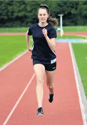  ?? PHOTO: LINDA ROBERTSON ?? Stretching out . . . Otago Girls’ High School’s Emma McKay (15) runs at the Caledonian Ground on Tuesday as she prepares for the weekend’s national secondary school track and field championsh­ips.