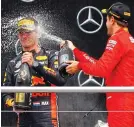  ?? REUTERS ?? Sweet success: Vettel sprays race-winner Verstappen