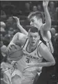  ??  ?? USC’S Nick Rakocevic drives against Santa Clara’s Josip Vrankic at Galen Center.