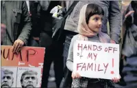  ?? PICTURE: EPA ?? Rosalie Gurna, 9, joins hundreds of protesters denouncing the travel ban from Muslim-majority countries, after it was enacted by US President Donald Trump recently, outside the internatio­nal terminal at LA Internatio­nal Airport in Los Angeles on...