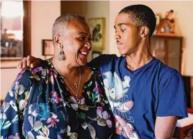  ?? Photos by Jessica Christian/The Chronicle ?? Teresa Robinson with grandson Hasani Algere-Coleman at her apartment in Richmond. Robinson considered leaving the state as she fell further into debt.