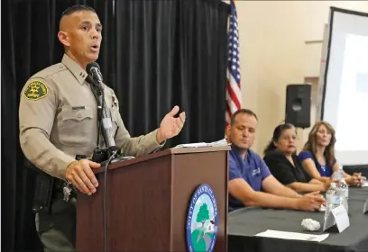  ?? Katharine Lotze/The Signal (See additional photos at signalscv.com) ?? Santa Clarita Valley Sheriff’s Station’s Captain Robert Lewis speaks to those gathered at the Parent Resource Symposium at the Activities Center on Wednesday.