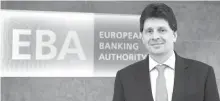  ?? AFP-Yonhap ?? European Banking Authority chief Adam Farkas poses for a picture at the EBA offices in London’s Canary Wharf financial district, Thursday.