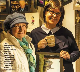  ??  ?? Club photograph­er Mairéad O’Keeffe (right) pictured with Kate Kenny during Castleisla­nd Camera Club’s fundraisin­g exhibition at Lower Main Street.Photo by John Reidy