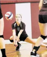  ?? Jerry Baker / For the Chronicle ?? Magnolia senior outside hitter Brooke Harris made a play against St. Agnes.
