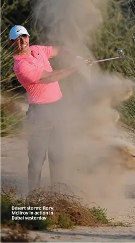  ??  ?? Desert storm: Rory McIlroy in action in Dubai yesterday