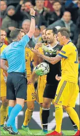  ?? AP ?? Referee Michael Oliver shows red card to Gianluigi Buffon.