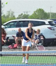  ?? Photo by Dane Fuelling ?? Isabelle Ortiz (pictured) and her doubles partner, Marisol Jackson, won a key victory Friday at the Norwell tennis sectional.