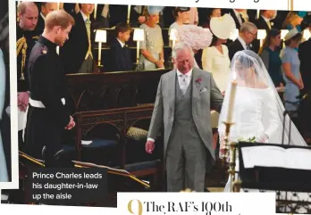  ??  ?? Prince Charles leads his daughter-in-law up the aisle