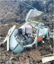  ?? HAWAII COUNTY FIRE DEPARTMENT VIA AP ?? A helicopter crashed in a Big Island lava field in Hawaii on Wednesday. Six people were safely evacuated from the site.