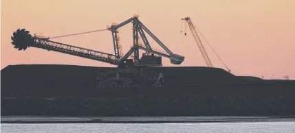  ?? ?? Rio Tinto’s iron ore loading facility near Karratha, Western Australia. Picture: Aaron Bunch/Getty Images