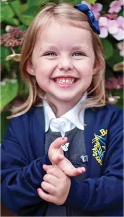  ??  ?? Excited: Lyra Cole, 4, in her smart new school uniform