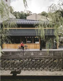  ??  ?? The streets of the Northern Kansai spa town, Kinosaki Onsen (opposite and left); grilled chicken wings at a guesthouse in Kyoto Prefecture (below)