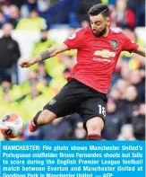  ??  ?? MAMCHESTER: File photo shows Manchester United’s Portuguese midfielder Bruno Fernandes shoots but fails to score during the English Premier League football match between Everton and Manchester United at Goodison Park in Manchester United. — AFP