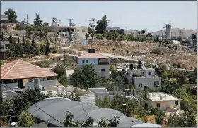  ??  ?? The Israeli army post (right) overlooks the site of the shooting of Mohammed al-Alami as seen from the al-Alami family house.