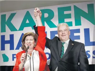  ?? John Bazemore Associated Press ?? KAREN HANDEL’S election victory Tuesday keeps Georgia’s 6th Congressio­nal District in the Republican column. The Democrats’ robust national effort to win the seat may have worked against them.