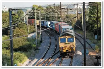  ??  ?? The Tilbury line is relatively busy with freight. And with just two passenger trains an hour in each direction, it has the capacity for plenty more during off-peak hours. Freightlin­er 66534 OOCL Express approaches Purfleet on August 25 2017 with the...