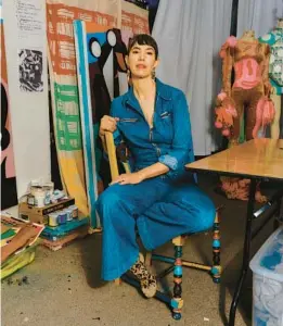  ?? YAEL MALKA/THE NEW YORK TIMES ?? Fashion designer Christian Joy is pictured Oct. 25 in her studio at her home in the Greenpoint neighborho­od of Brooklyn.