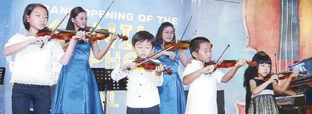  ??  ?? Junior musicians at the launch of the Manila Symphony Orchestra Recital Hall. Photos by BENING BATUIGAS