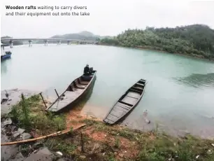  ??  ?? Wooden rafts waiting to carry divers and their equipment out onto the lake
The shelter of the Wall offers a welcome respite from the dusty wind that howls in from the north