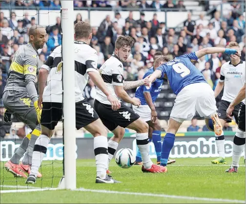  ?? PICTURES: Action Images ?? UNFORTUNAT­E: Derby’s Lee Grant, left, scores an own goal to settle the game