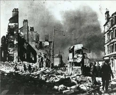  ??  ?? Searching for survivors after the blitz in Clydebank, which started on March 13, 1941