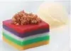  ??  ?? ‘Sapin-sapin’ made from layers of glutinous rice, coconut milk and latik, doused with salted caramel sauce