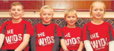  ??  ?? Four Widnes mascots are pictured before the first XV’s game against Wigan at Heath Road on the opening day of the season.