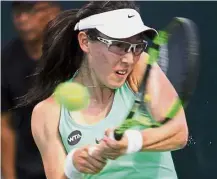  ??  ?? Better player: Zheng Saisai of China returns a shot to compatriot Zhu Lin in the first round yesterday. Saisai won 7- 6 (7-5), 2- 6, 6-3.