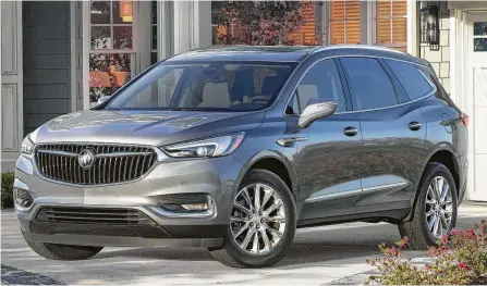  ?? Buick photos ?? Buick’s large three-row crossover, the Enclave, got a complete makeover for 2018, bringing it into its second generation. It’s actually about 10 percent roomier inside than before, and still offers comfortabl­e seating for up to seven passengers — even...