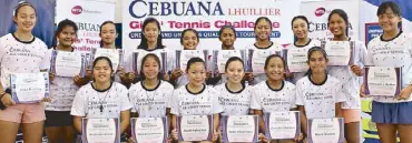  ??  ?? Participan­ts in the 14- and 16-and-under divisions pose before vying in the Cebuana Lhuillier Girls’ Tennis Challenge at the Makati Sports Club.