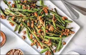  ??  ?? Charred Sesame Pecan Green Beans (Courtesy of American Pecans)