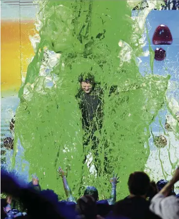  ??  ?? Host shelton gets slimed. — Photos: AP