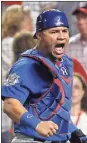  ?? Pablo Martinez Monsivais / AP ?? Chicago catcher Willson Contreras celebrates after catching a foul ball for the final out of Game 1 in the National League Division Series on Friday.
