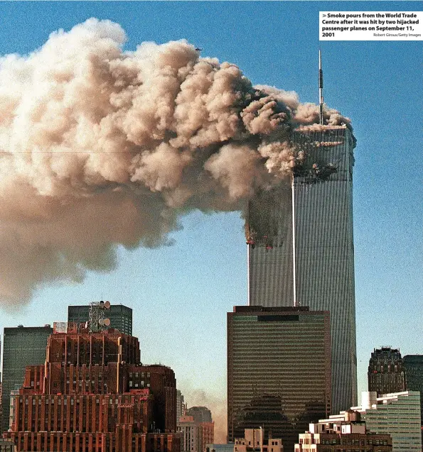  ?? Robert Giroux/Getty Images ?? Smoke pours from the World Trade Centre after it was hit by two hijacked passenger planes on September 11, 2001