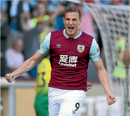  ?? AP ?? New Zealand striker Chris Wood celebrates the first of his two goals in Burnley’s 2-0 win over Norwich.