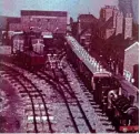  ??  ?? An early photograph of the missing model, showing a scene set in the 1880s of a passenger train leaving for Boston. The granary still exists, but the station site is mostly covered by new housing and the buildings have been replaced by a tyre depot. HHHS ARCHIVES