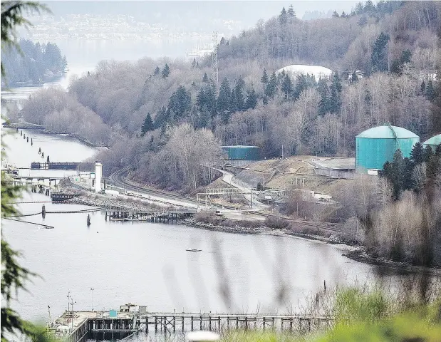  ?? CARMINE MARINELLI / POSTMEDIA NEWS ?? The expansion of Kinder Morgan’s Trans Mountain pipeline now looks less certain with opposition from B.C.’s NDP- Green alliance, despite federal approval for the project. Above, a Kinder Morgan facility on Burrard Inlet in Burnaby B.C.