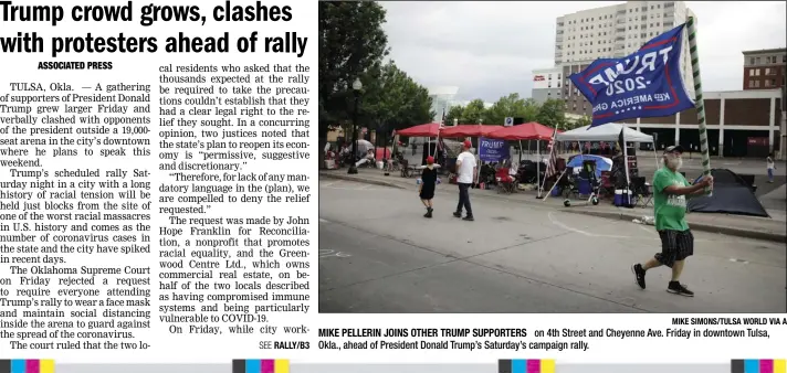  ?? MIKE SIMONS/TULSA WORLD VIA A ?? MIKE PELLERIN JOINS OTHER TRUMP SUPPORTERS on 4th Street and Cheyenne Ave. Friday in downtown Tulsa, Okla., ahead of President Donald Trump’s Saturday’s campaign rally.