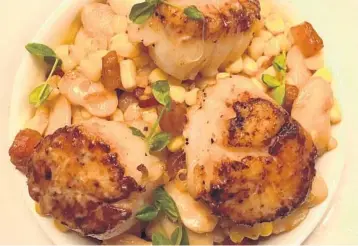  ?? CLAIRE PEREZ / COURTESY ?? Seared scallops with lima bean and corn succotash at the Little Chalet in Boca Raton.