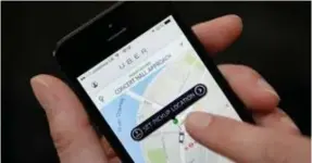  ?? © belga ?? Uber is een mobiliteit­sapp …